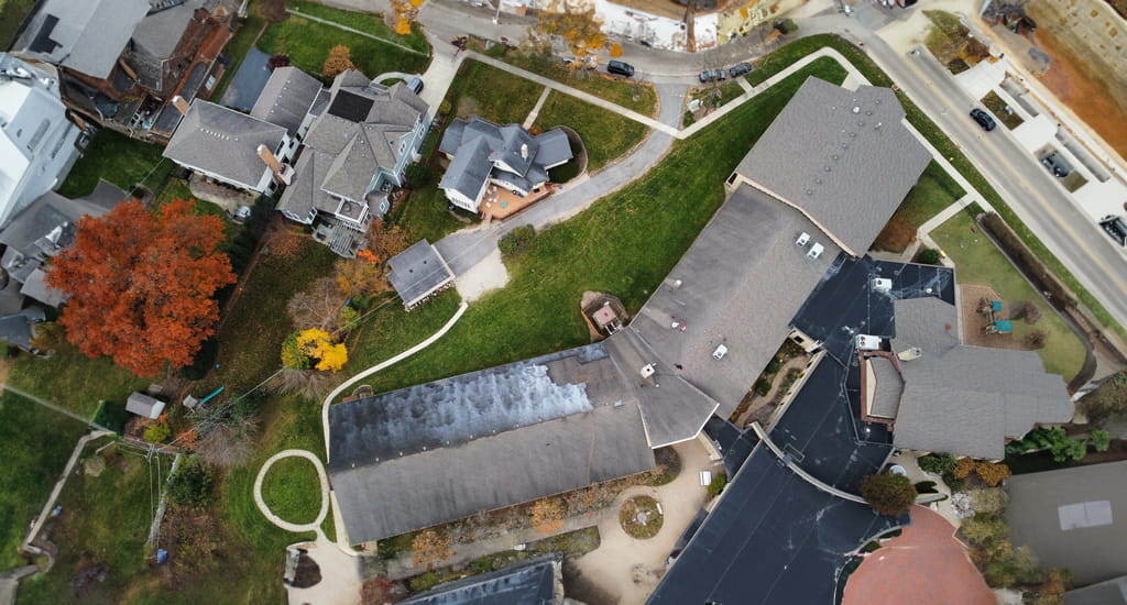 Roof being treated with Roof Maxx prior to installation of solar panels