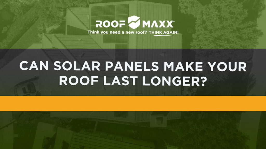 Title card with the title "Can Solar Panels Make Your Roof Last Longer?" and the Roof Maxx logo on a green transparent background over an image looking down at a residential roof with solar panels on it.