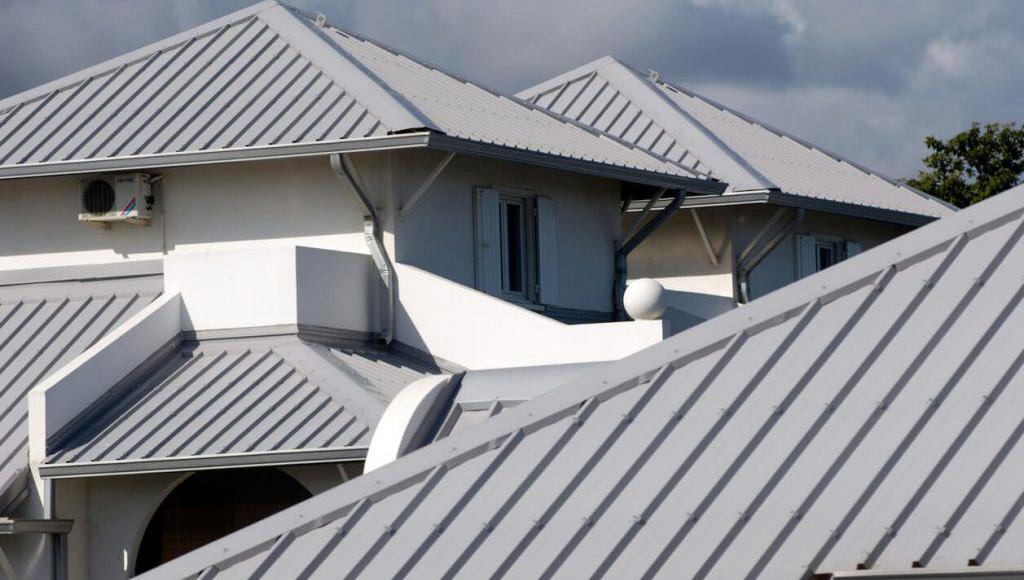 Metal rooftops on homes in city suburb.