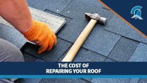 A roofer applies shingles to an asphalt shingle roof