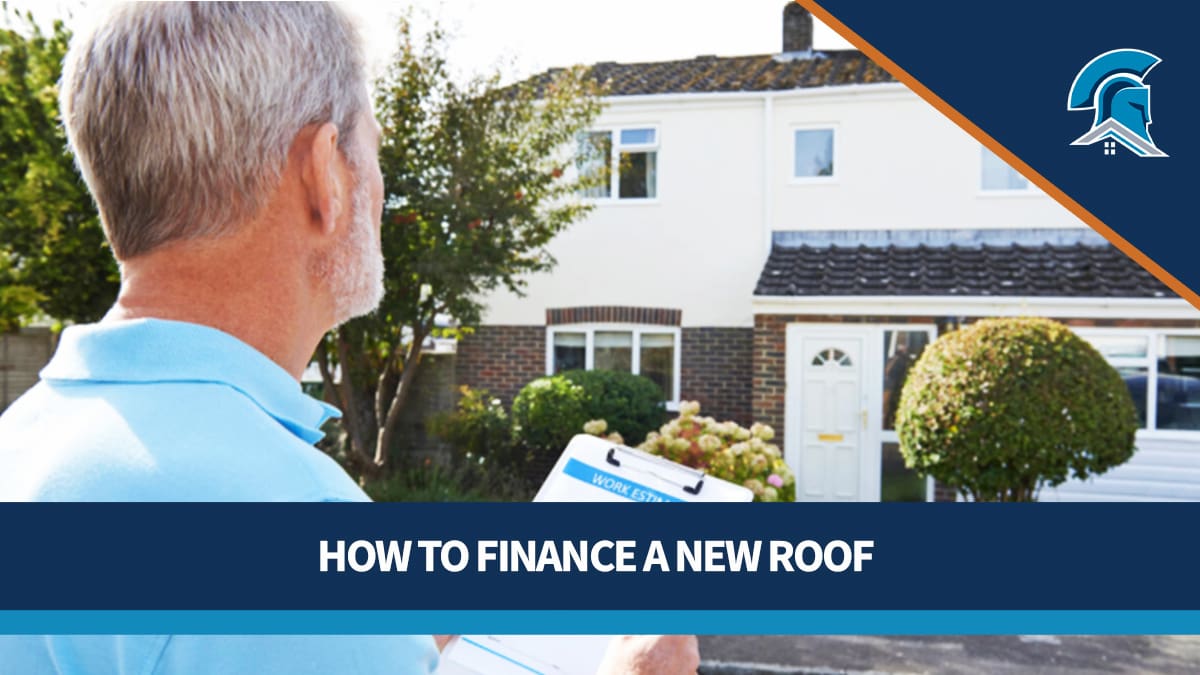 A roofing contractor works on an estimate to replace the roof on a customer's home