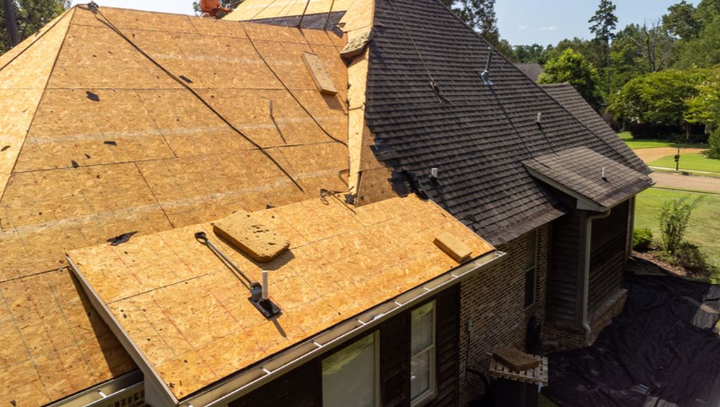 A residential roof in the middle of a roof replacement