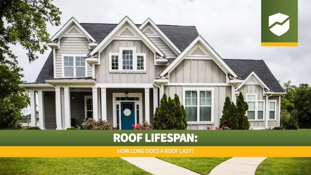 Roof Maxx logo and title "Roof Lifespan How Long Does a Roof Last" on an image of a single family home that is new construction cottage style house with hardy board and a partial metal roof. It is grey with a teal door and there is great curb appeal. The house has a double front entrance and it is on a large lot.