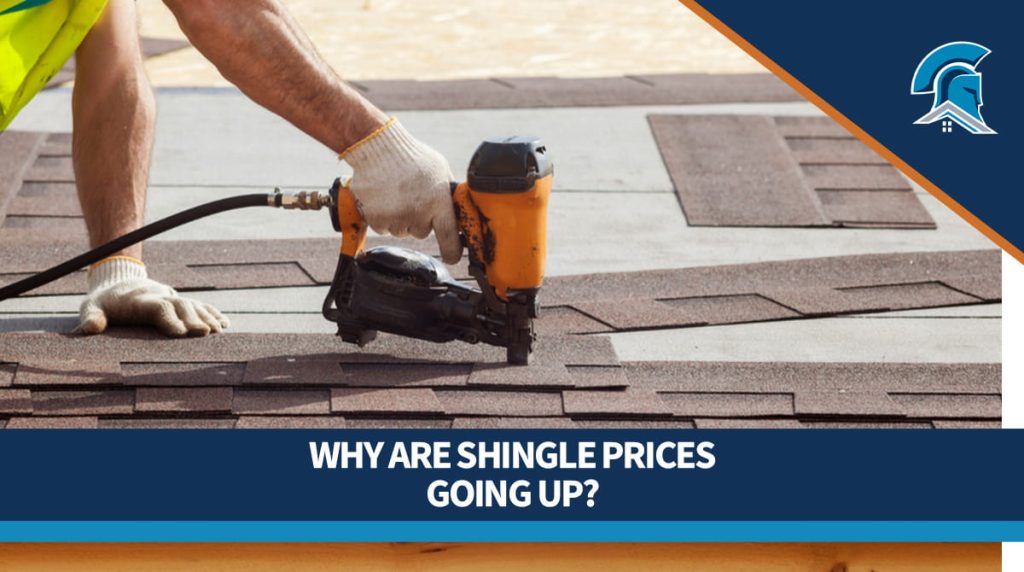 A roofer uses a nail gun to fasten staples to the roof.