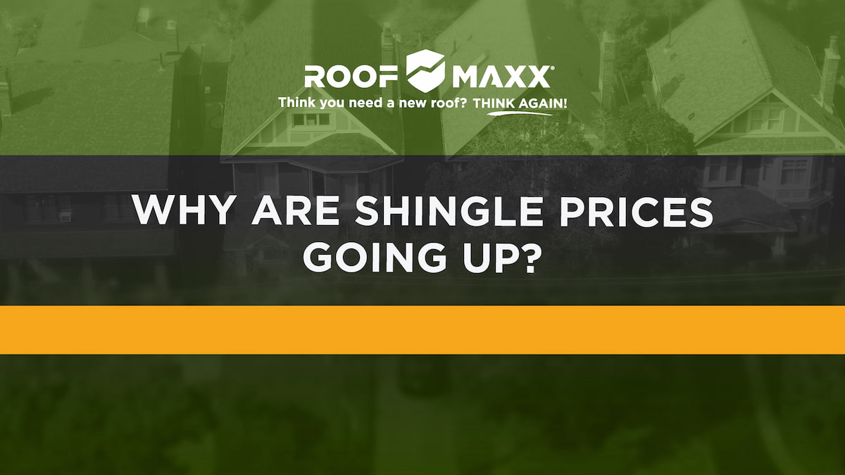 Title card with Roof Maxx logo and title "Why Are Shingle Prices Going Up?" on a transparent green over a background image of residential roofs finished with asphalt shingles.