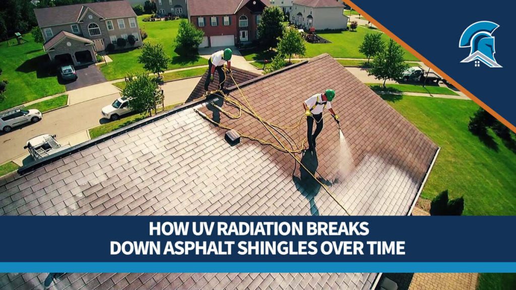Two Roof Maxx dealers spray an asphalt shingle roof from an aerial view on a sunny day.