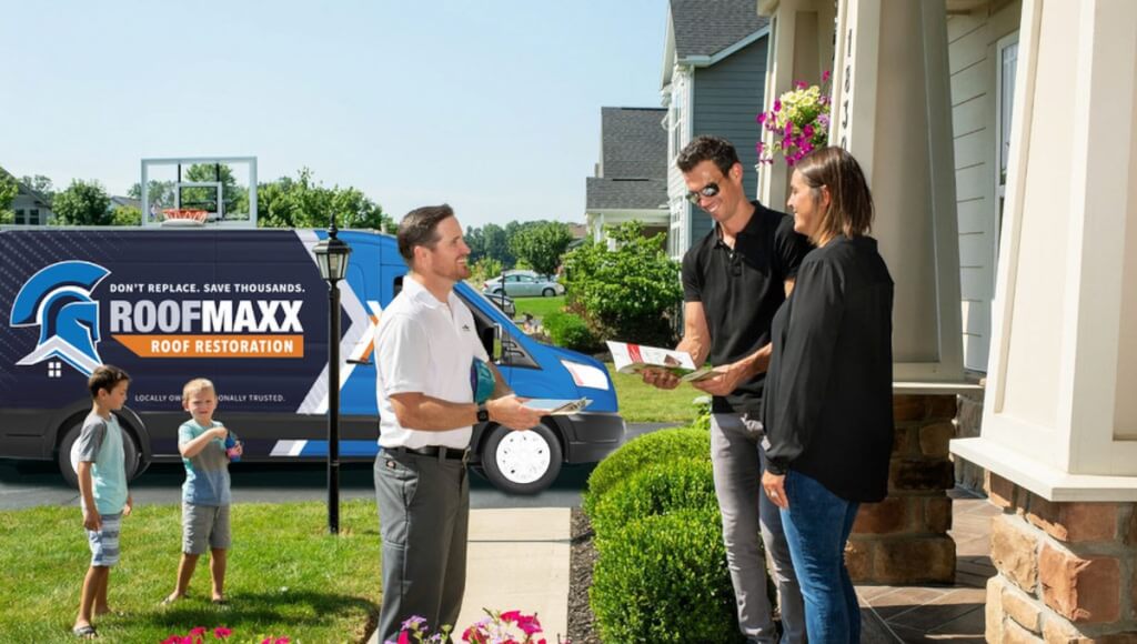 A Roof Maxx dealer explains the Roof Maxx treatment process to homeowners