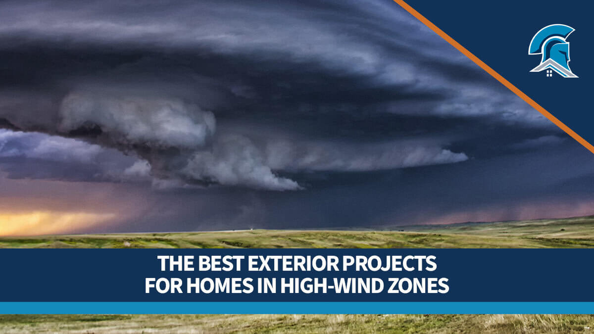 A supercell thunderstorm rolling in over the plains in the Midwest with text overlay reading The Best Exterior Projects for Homes in High-Wind Zones.