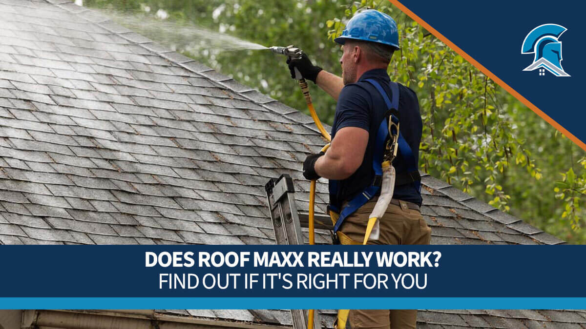 A Roof Maxx dealer in a blue hard hat sprays treatment onto a customer's asphalt shingle roof with text overlay reading 'Does Roof Maxx Really Work? Find Out If It's Right For You.'