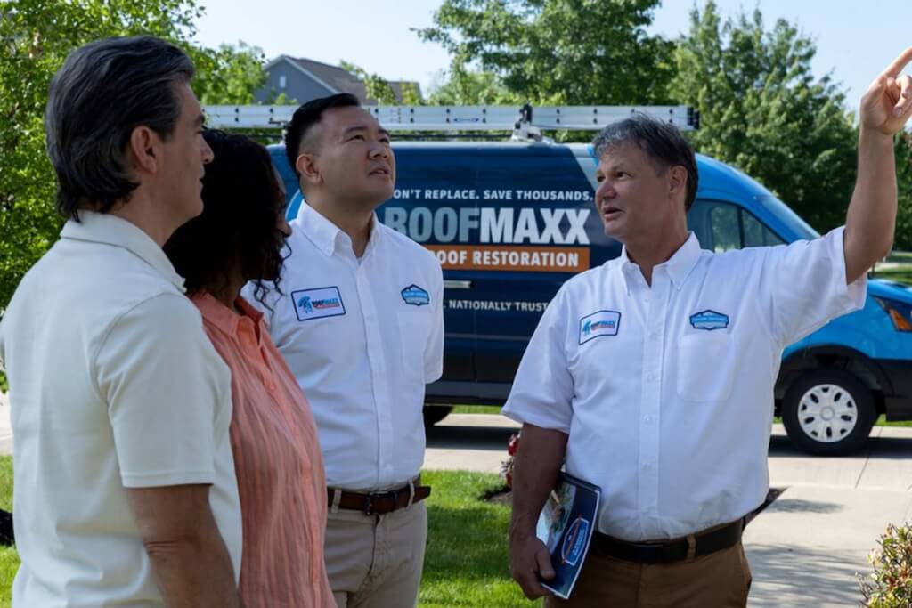 Roof Maxx dealers from Columbus visit a local homeowner.
