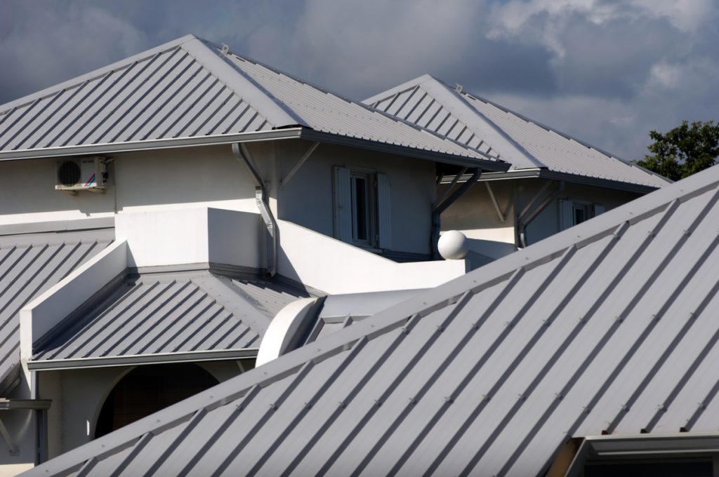 Top of home with metal style roofing.