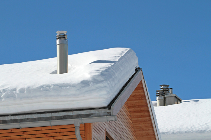 tailpipes on snowy roofs