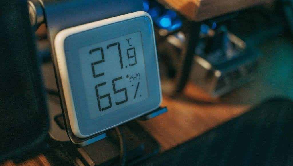 Close up of a digital thermometer and hygrometer.